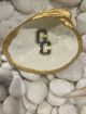 Oyster shell jewelry dish with GC logo